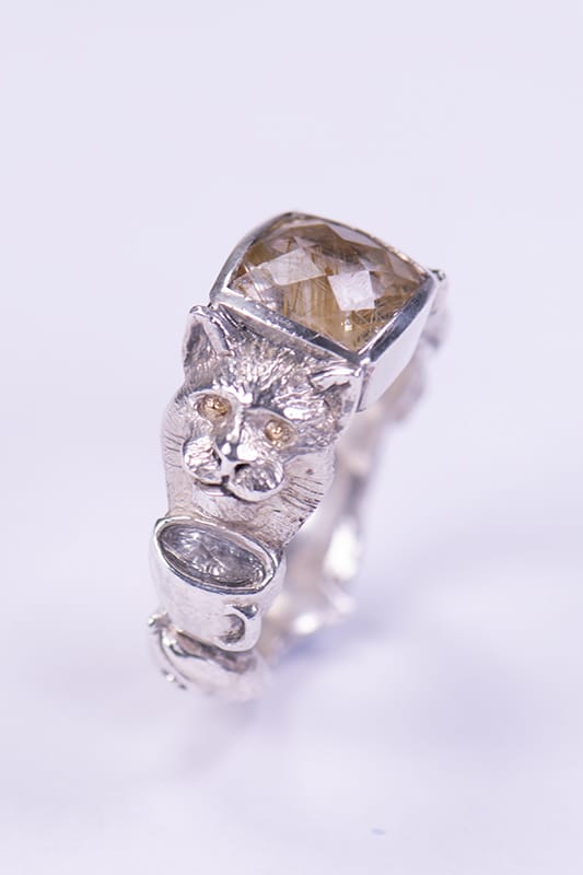 Rufus ring, wax-carved with bezel-set rutilated quartz